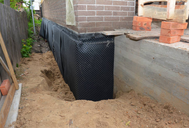 Happy homeowners after waterproofing job in Cynthiana